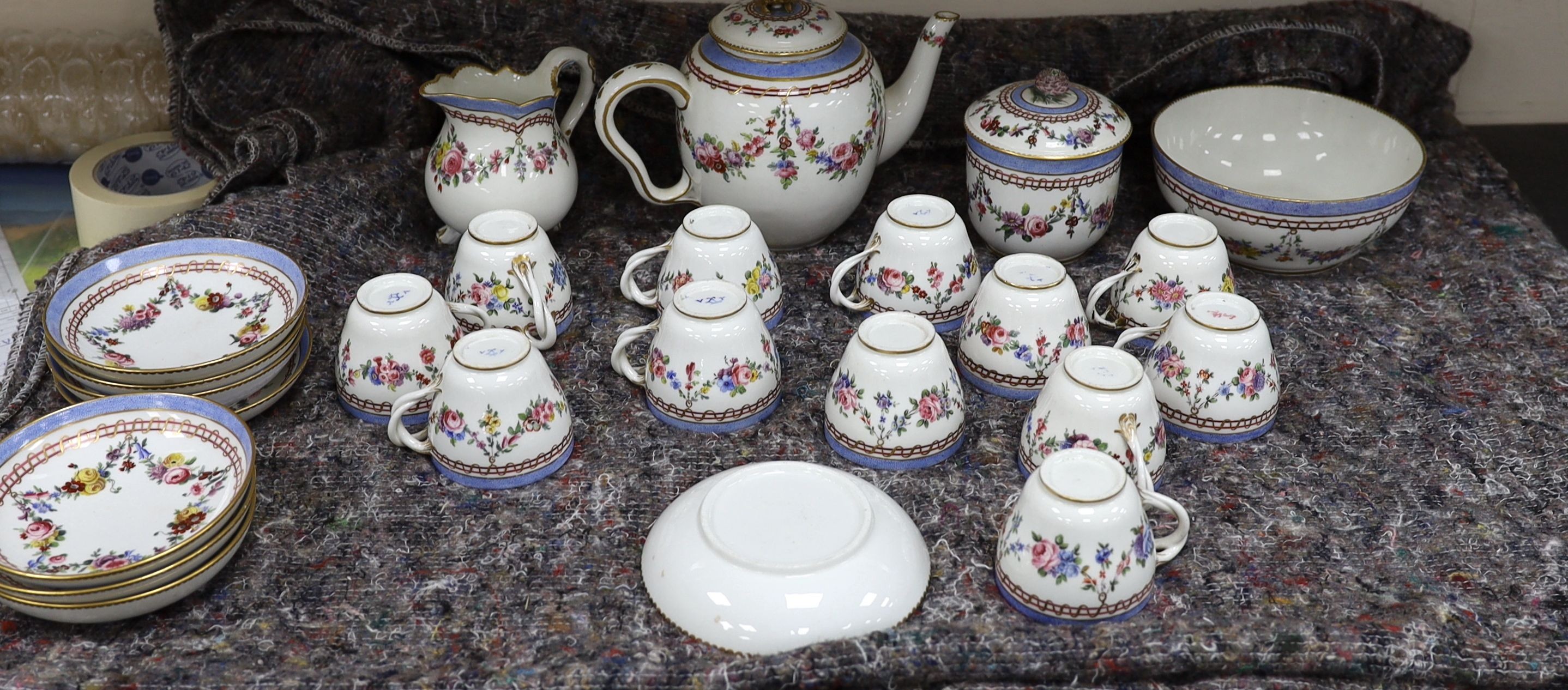 A Sevres porcelain part tea service, c.1772-3, One teacup handle repaired